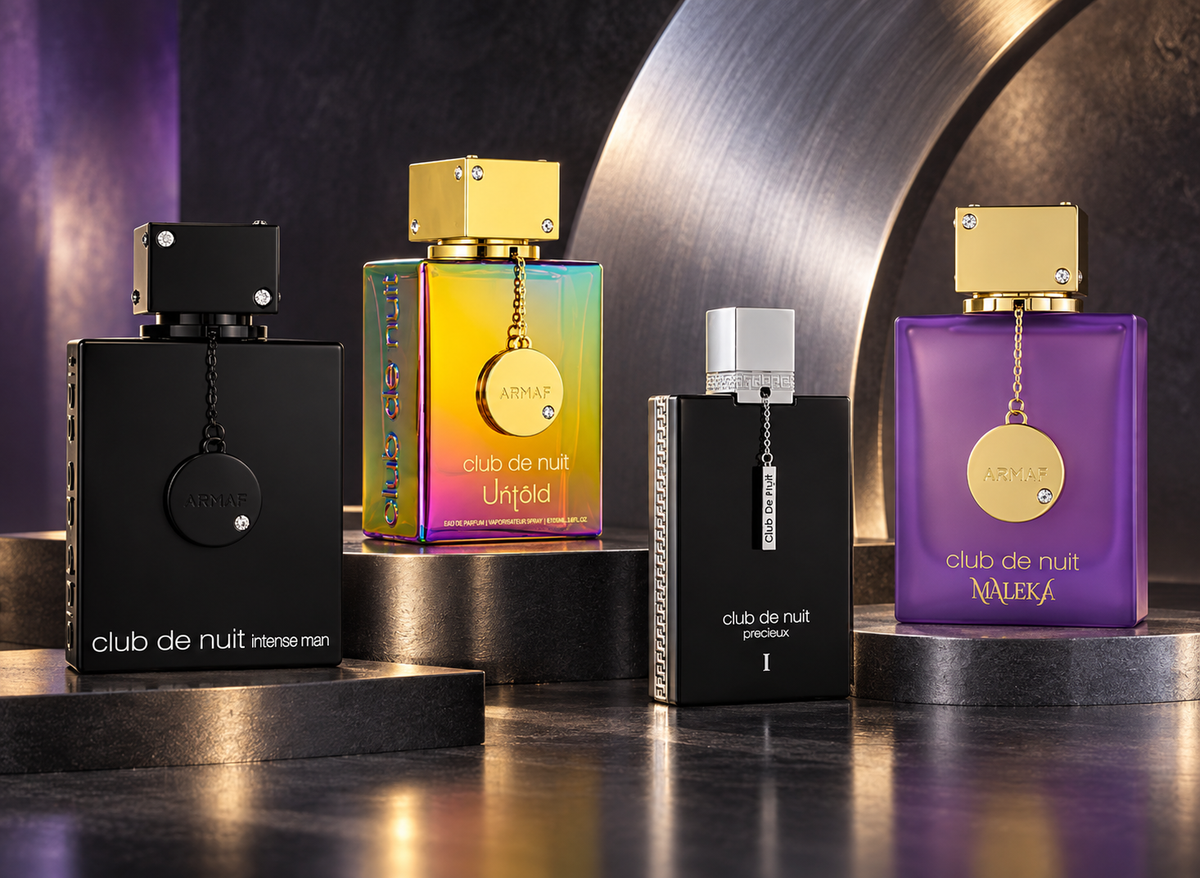 Armaf Club de Nuit Intense Man, Untold, Precieux and Maleka bottles against graphite and brushed silver.