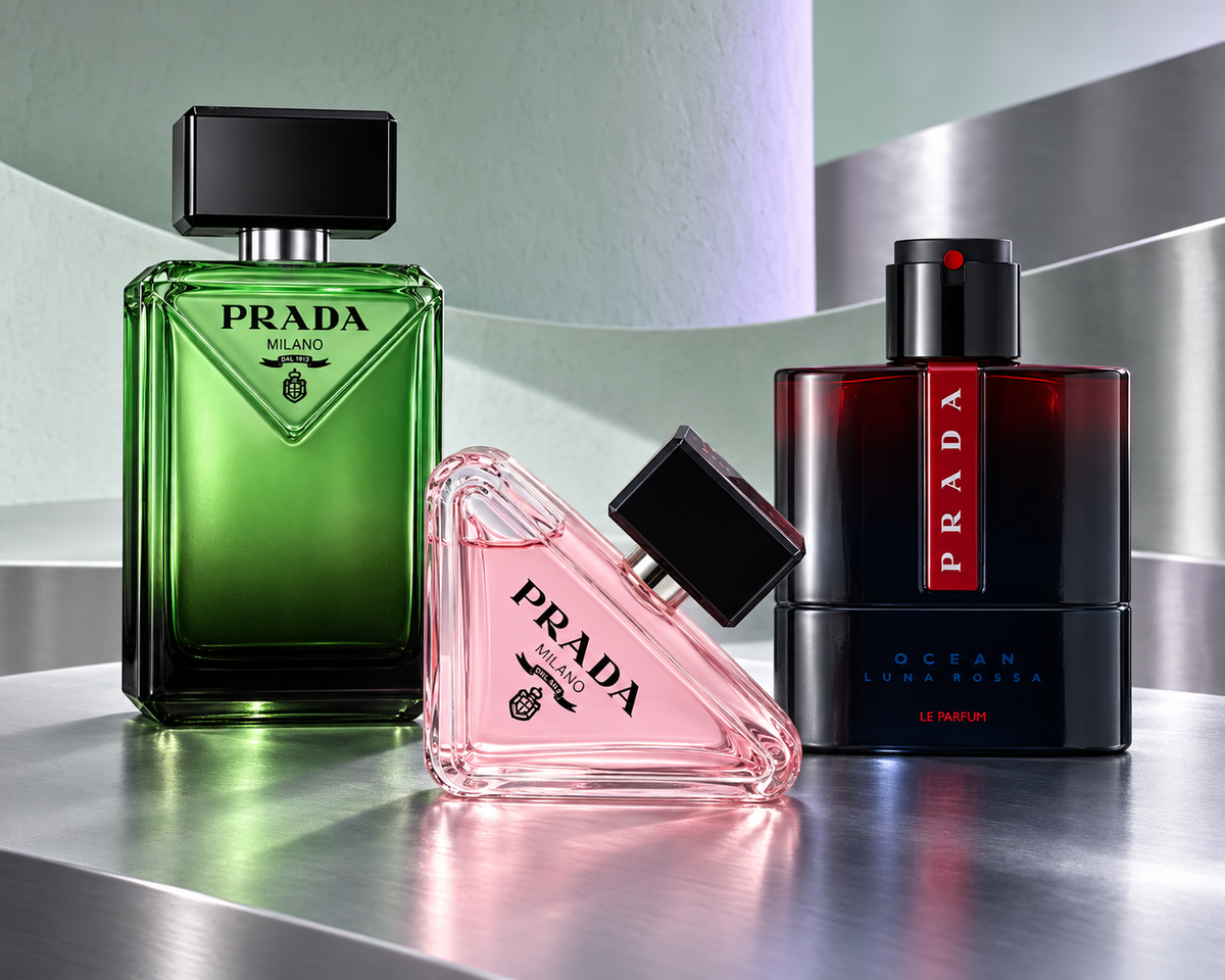 Prada Paradigme, Paradoxe and Luna Rossa Ocean Le Parfum bottles in a celadon and chrome architectural setting
