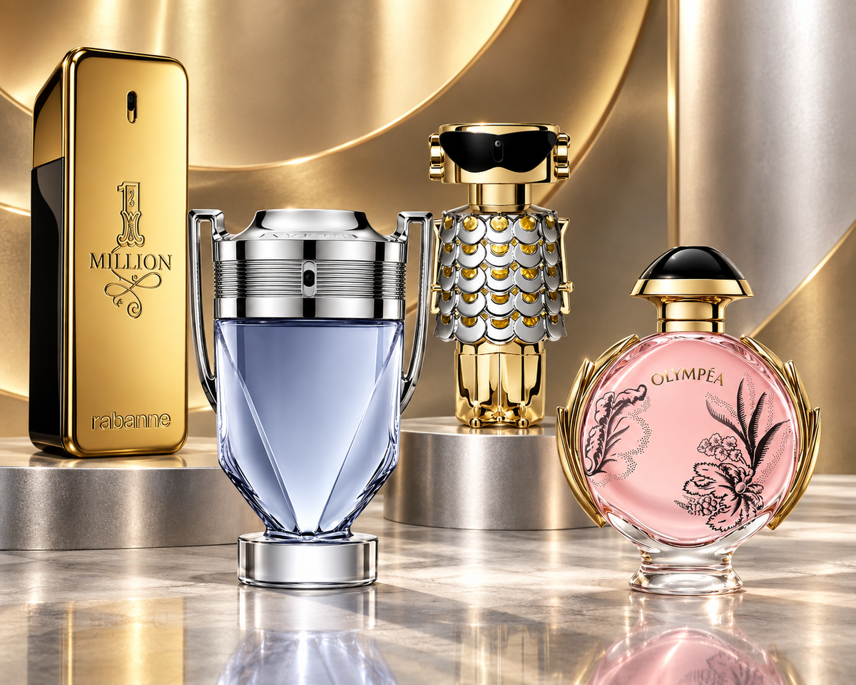 Rabanne 1 Million, Invictus, Fame and Olympea Blossom bottles in a champagne gold and silver setting