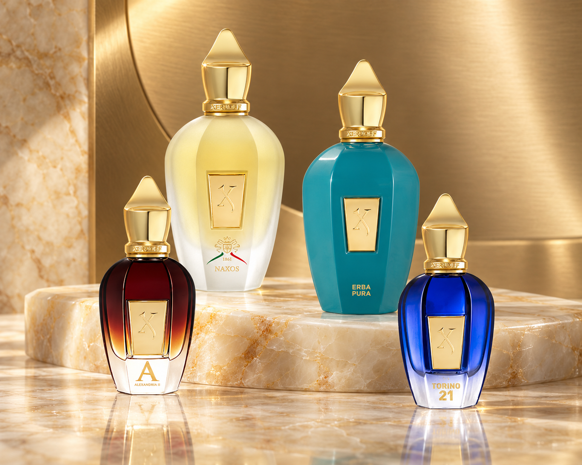 Xerjoff Naxos, Erba Pura, Alexandria II and Torino21 bottles on pale onyx with champagne gold.