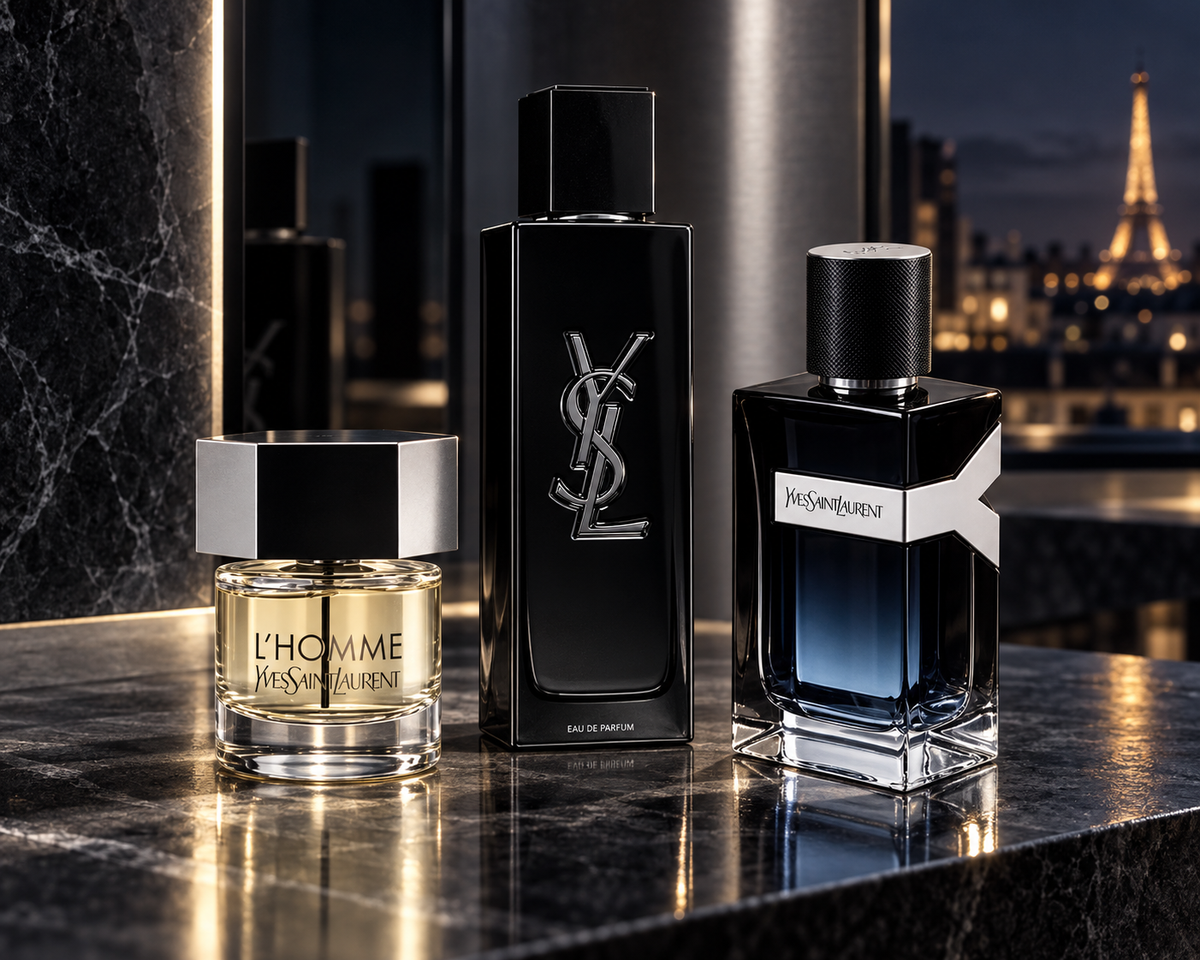 Yves Saint Laurent Y, L’Homme and MYSLF perfume bottles in a dark Parisian atelier.