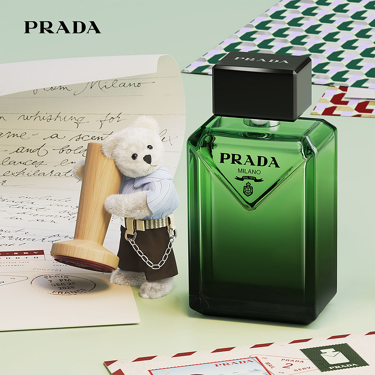 Official Prada Paradigme holiday fragrance campaign with decorative gift styling