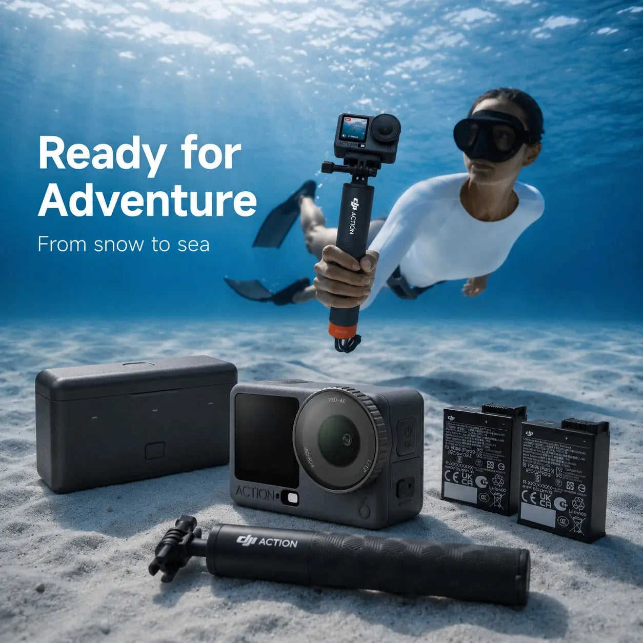 Action camera with accessories on a beach with water in the background