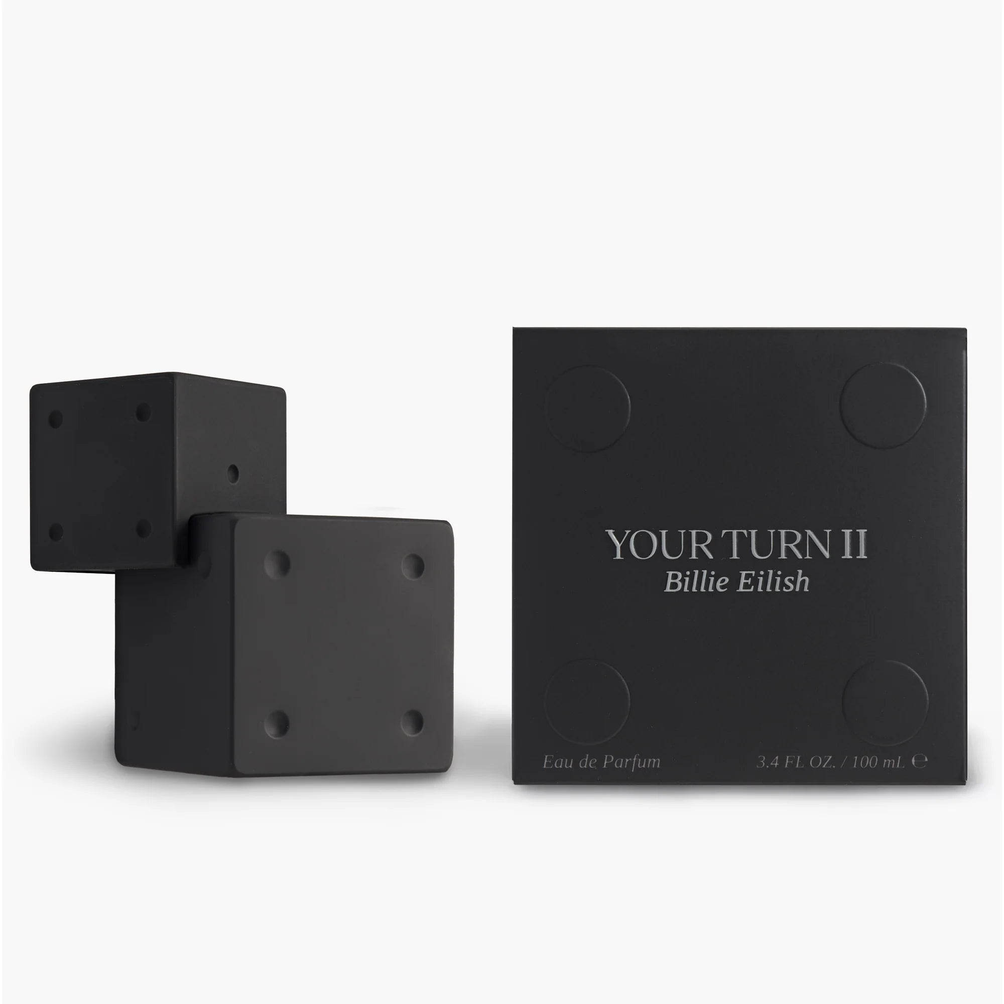 Black 'Your Turn II' Billie Eilish perfume bottle and packaging on a white background